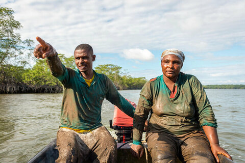 two people on a boat