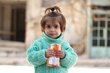 With the right food and regular monitoring, Tasneem is now stronger and happier. Photo: WFP/Khudr Alissar