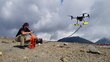 Clayton Covel, from help.NGO, ensures a safe take-off of the canister-carrying drone. Photo: WFP/Katarzyna Chojnacka