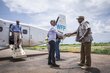 Passengers disembark from an UNHAS aircraft in Malakal, Upper Nile. UNHAS flies to the town three times a week. Photo: WFP/Gabriela Vivacqua