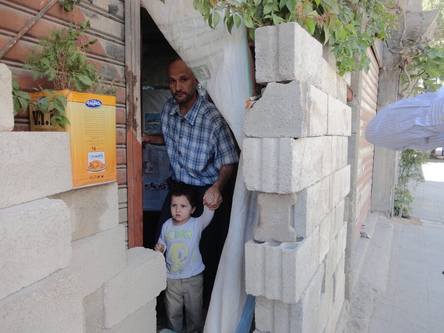 Mohammed from Al-Tal town was displaced to the neighbouring town Ma’raba in Rural Damascus. Hussam was part of the mission in September 2012. Photo: WFP/Hussam Al Saleh