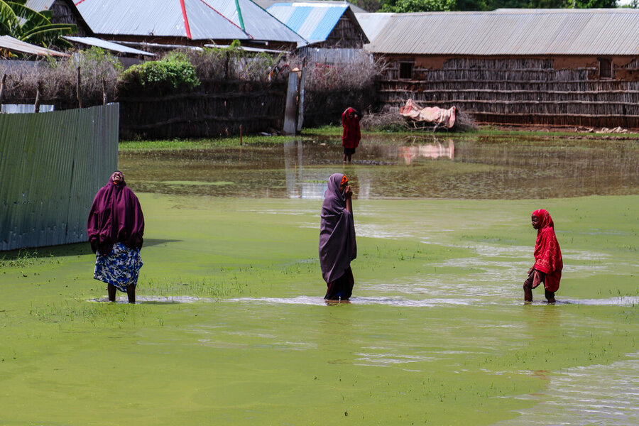 Women in flood-hit Somalia. They are often on the frontlines of a changing climate. Photo: WFP/Abdirahman Yussuf Mohamud