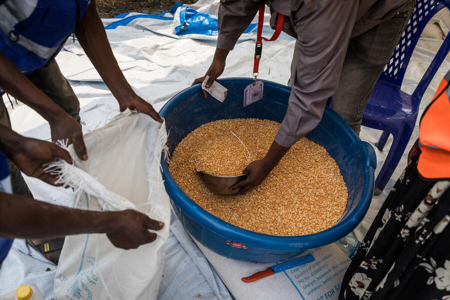 WFP assistance, including maize meal, yellow split peas and vegetable oil, is vital for destitute Congolese returning home, at a time when food prices are spiking. WFP/Jerry Ally Kahashi