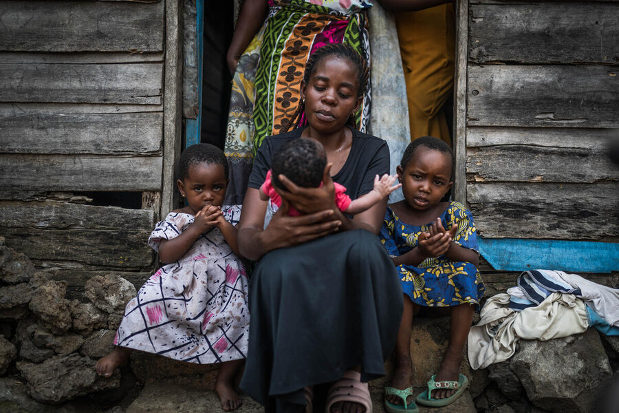 Safi and her children in her hometown of Sake. She counts among many women in northeastern Congo whose husbands have been killed or gone missing during the conflict. WFP/Jerry Ally Kahashi