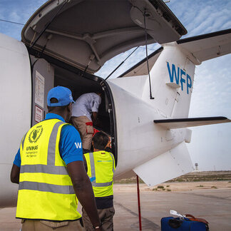 UNHAS staff preparing for flight