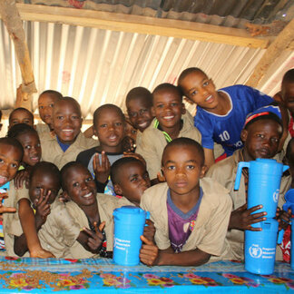 Children after eating nutrient-rich school meal provided by WFP