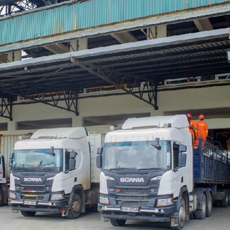 Lorries carrying wheat for transportation to the drought-affected communities in Kenya.