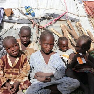 Children with fortified meals distributed by WFP to cater for the malnutrition seen in IDP camps in North Eastern Nigeria