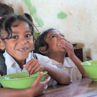 children are having their school meals