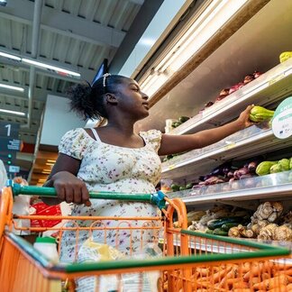 Woman shopping in supermarket