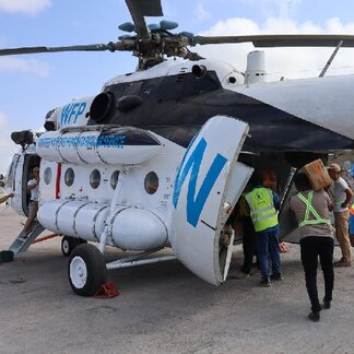 Loading a WFP helicopter in Mogadishu, Somalia, to deliver aid to hard-to-reach areas. Photo credit: WFP/Geneva Costopulos