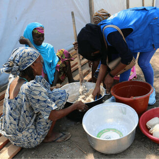 Women cooking food items distributed by the WFP in Cameroon